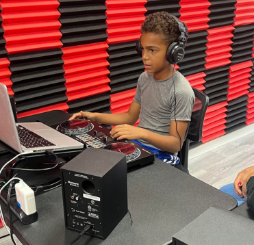 Young Student DJing at Cuts Academy